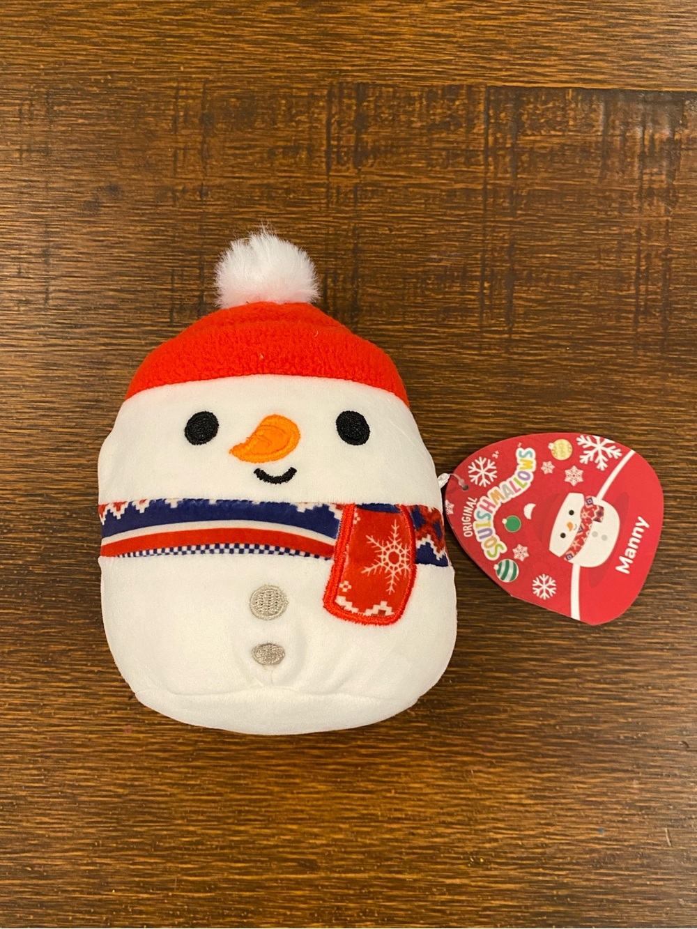 Squishmallows “Manny” White and Red Snowman Plush